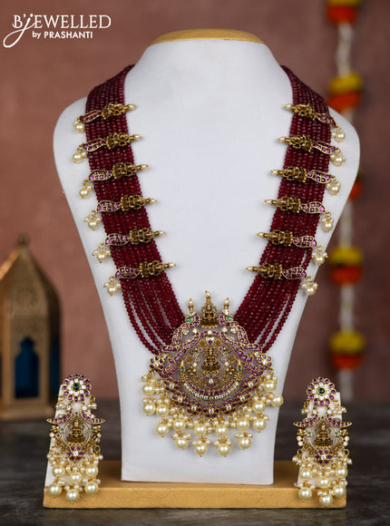 Beaded multilayer maroon necklace lakshmi pendant with kemp & cz stones and pearl hangings