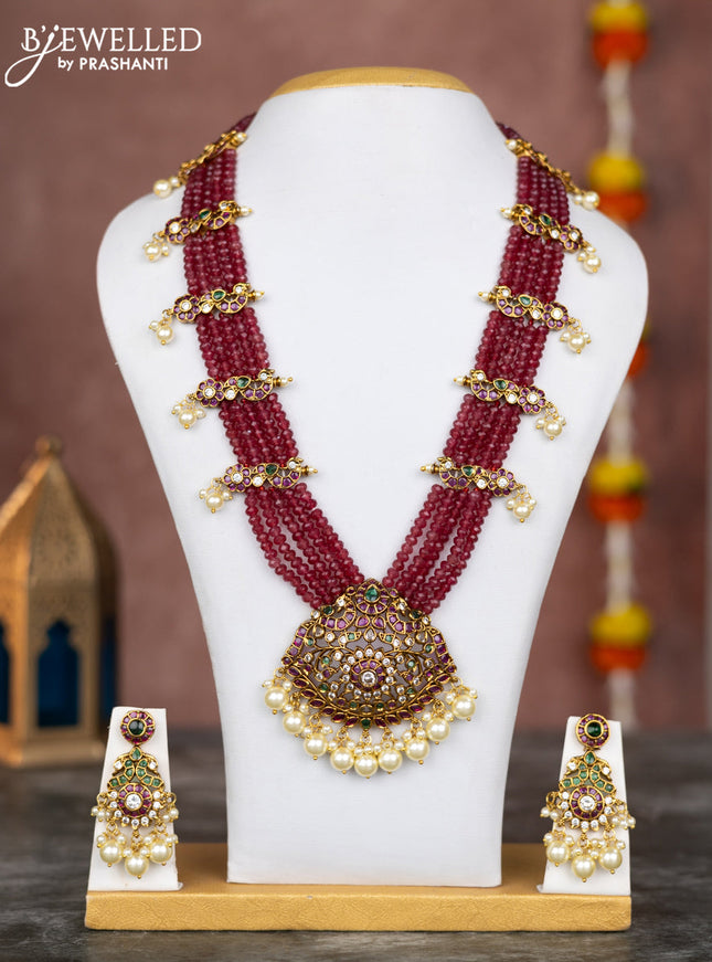 Beaded multilayer maroon necklace with kemp & cz stones and pearl hangings in victorian finish
