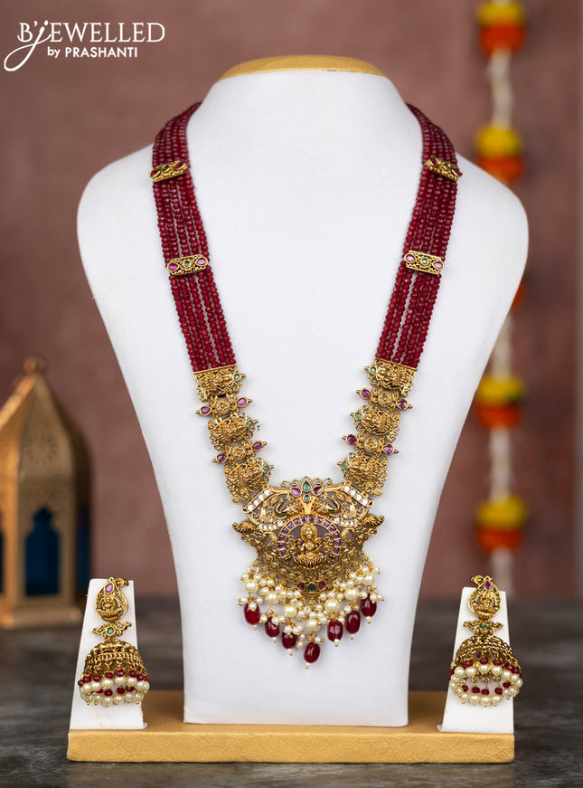 Beaded multilayer maroon necklace lakshmi pendant with kemp & cz stones and pearl hangings in victorian finish
