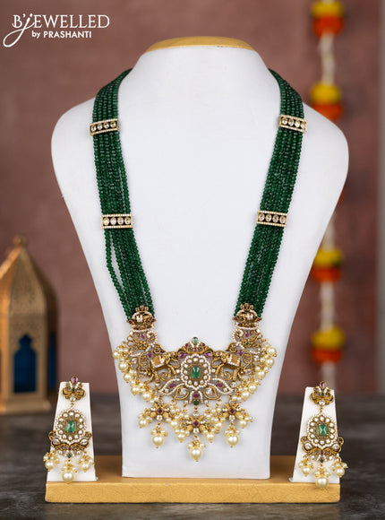 Beaded multilayer green necklace elephant design with kemp & cz stones and pearl hangings in victorian finish