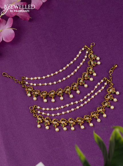 Antique triple layer maatal peacock design with kemp & cz stones and pearl hangings