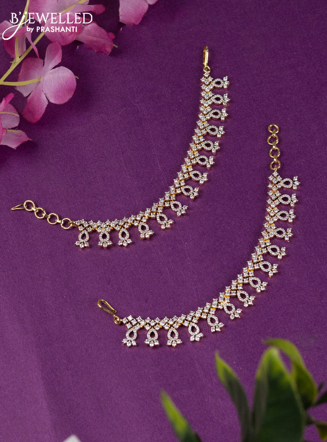 Zircon maatal with cz stones in gold finish