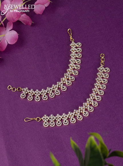 Zircon maatal with cz stones in gold finish