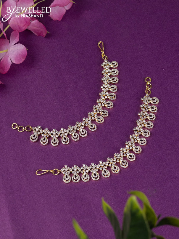 Zircon maatal with cz stones in gold finish