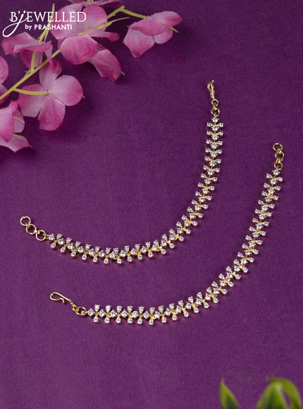 Zircon maatal with cz stones in gold finish