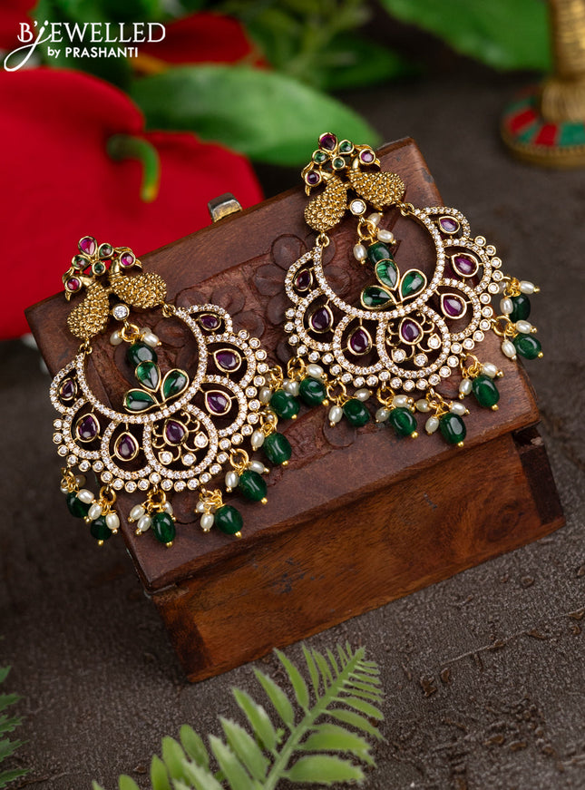 Antique earrings peacock design with kemp & cz stones and pearl & green beads hangings
