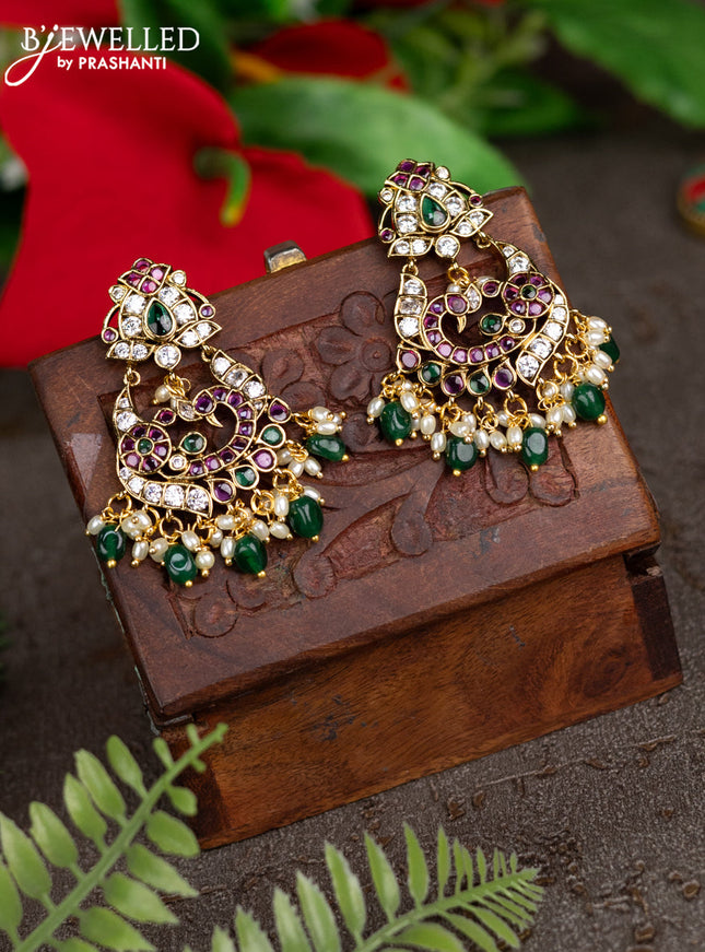 Antique earrings peacock design with kemp & cz stones and pearl & green beads hangings
