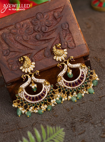 Antique earrings peacock design with kemp & cz stones and pearl & green beads hangings