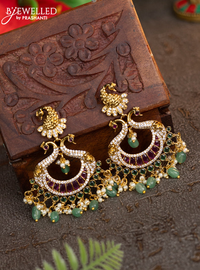 Antique earrings peacock design with kemp & cz stones and pearl & green beads hangings