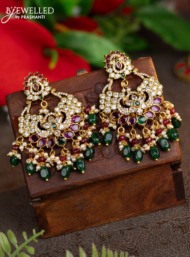 Antique earrings peacock design with kemp & cz stones and pearl & green beads hangings