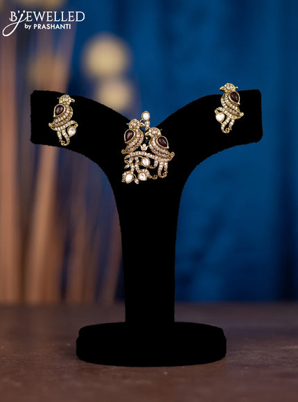 Pendant sets parrot design with purple & kundan and cz stones in victorian finish\