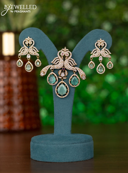 Pendant sets double peacock design with mint green & emerald and cz stones in victorian finish