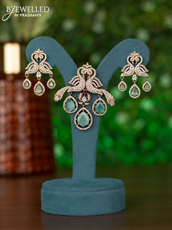 Pendant sets double peacock design with mint green & emerald and cz stones in victorian finish
