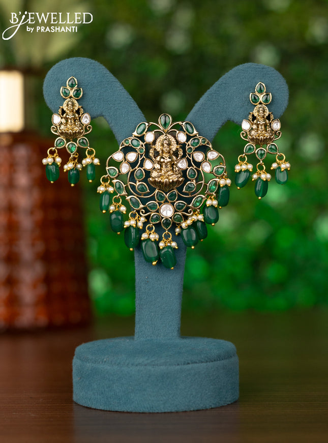Pendant sets lakshmi design with emerald & kundan stones and pearl & beads hangings in victorian finish
