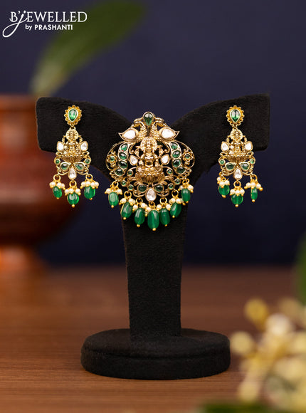 Pendant sets lakshmi design with emerald & kundan stones and pearl & beads hangings in victorian finish