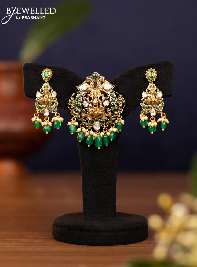 Pendant sets lakshmi design with emerald & kundan stones and pearl & beads hangings in victorian finish
