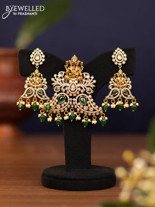 Pendant sets ganesha design with emerald & cz stones and pearl & beads hangings in victorian finish
