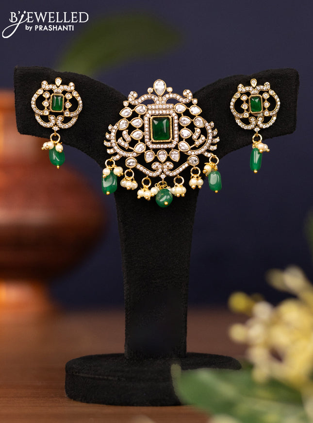 Pendant set with emerald & cz stones and pearl & beads hangings in victorian finish