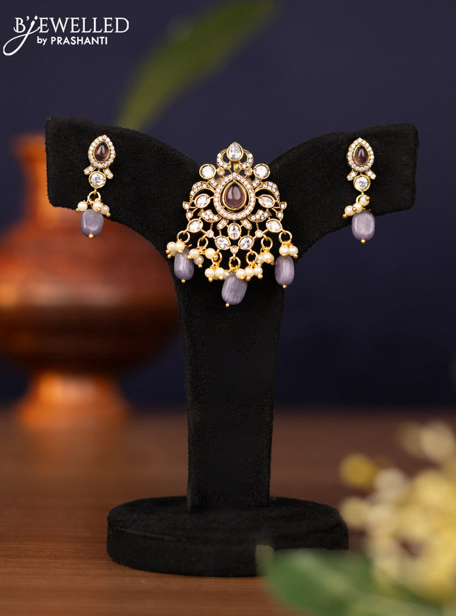 Pendant set with violet & cz stones and pearl & beads hangings in victorian finish