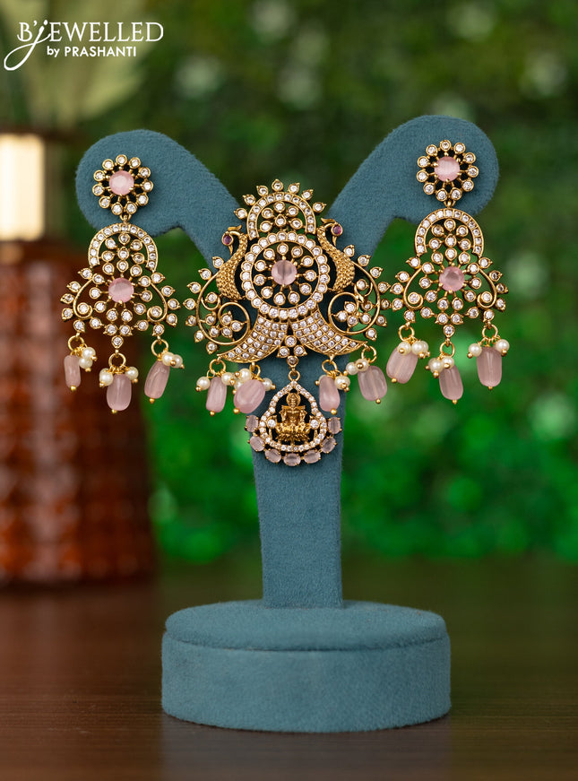 Pendant set peacock design with baby pink & cz stones and pearl & beads hangings in victorian finish