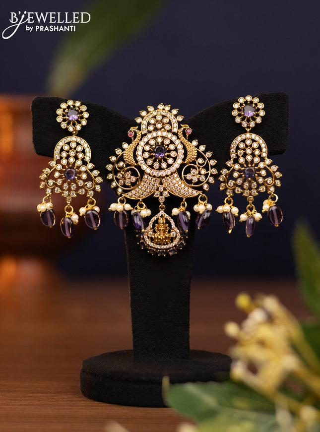 Pendant set peacock design with violet & cz stones and pearl & beads hangings in victorian finish