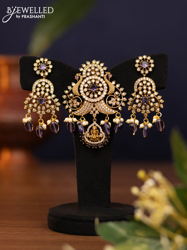 Pendant set peacock design with violet & cz stones and pearl & beads hangings in victorian finish
