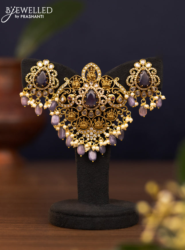 Pendant set lakshmi design with violet & cz stones and pearl & beads hangings in victorian finish