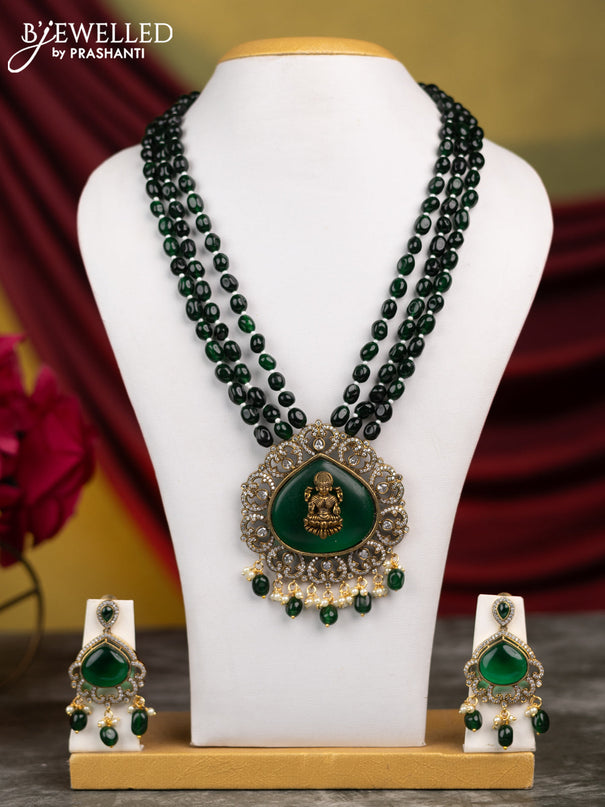 Beaded triple layer green necklace lakshmi design with emerald & cz stones and pearl & beads hangings in victorian finish