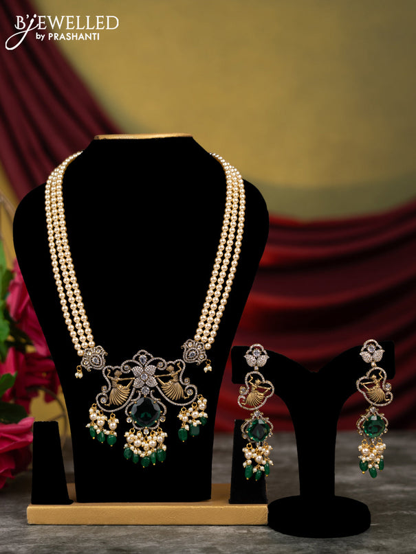 Beaded necklace with emerald & cz stones and pearl & green beads hangings in victorian finish