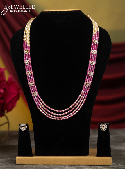 Crystal beaded pink necklace with heart shape side pendant and cz stones