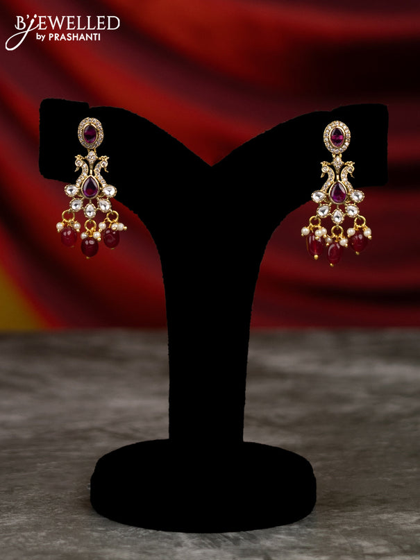 Beaded multilayer maroon necklace with peacock side pendant and ruby & cz stones in victorian finish