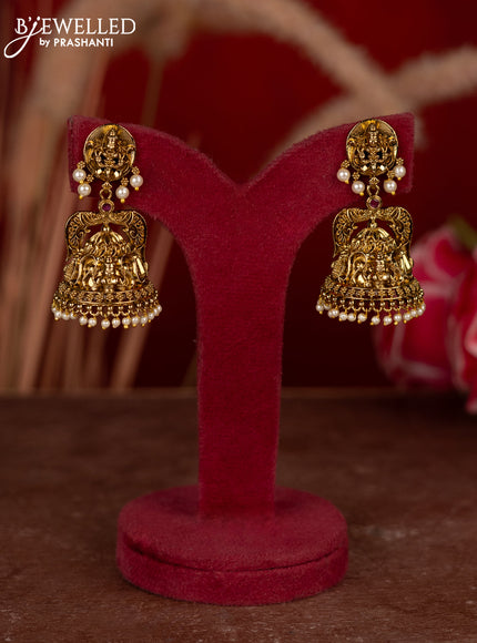 Antique jhumkas lakshmi design with ruby stones and pearl hangings