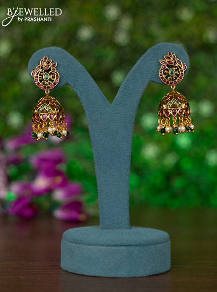Antique jhumkas peacock desgin with kemp stones and pearl & green beads hangings
