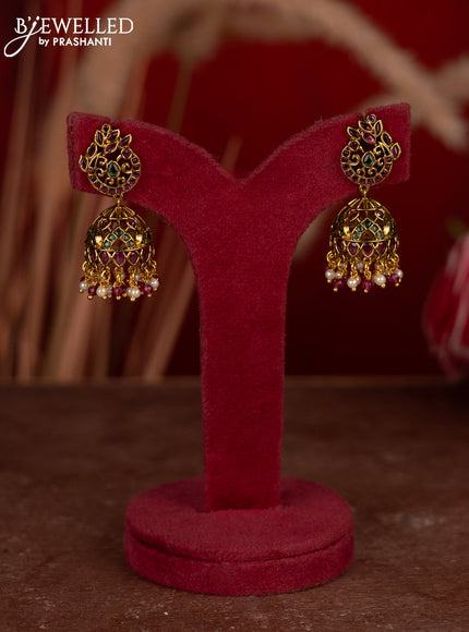 Antique jhumkas peacock design with kemp stones and pearl & pink beads hangings