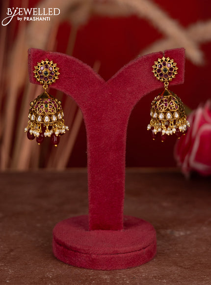 Antique jhumkas with kemp & kundan stones and pearl & pink beads hangings