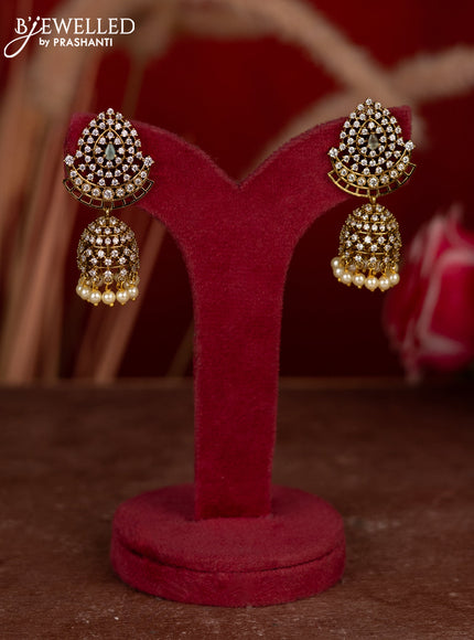 Antique jhumkas with mint green & cz stones and pearl hangings