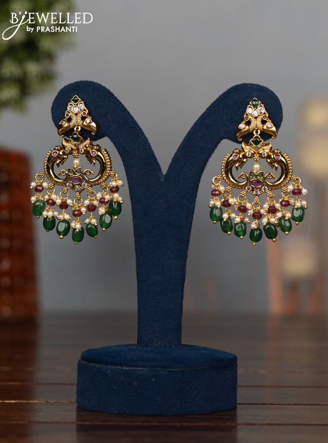 Antique earrings elephant design with kemp & cz stones and pearl & green beads hangings