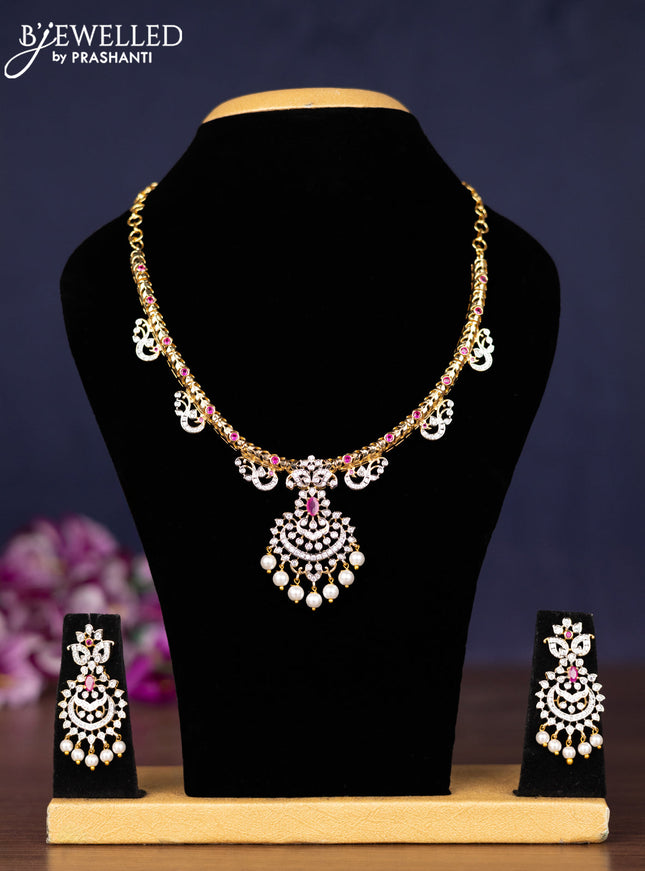 Zircon necklace with ruby & cz stones and pearl hangings in gold finish