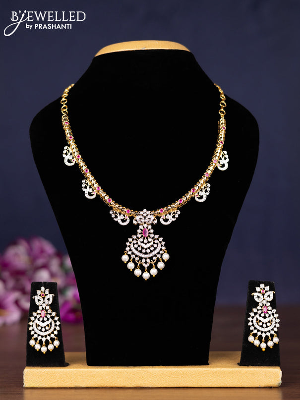Zircon necklace with ruby & cz stones and pearl hangings in gold finish