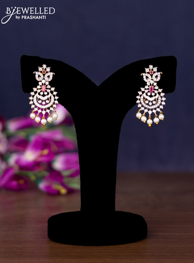 Zircon necklace with ruby & cz stones and pearl hangings in gold finish