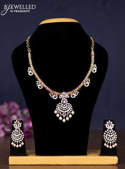 Zircon necklace with multicolour & cz stones and pearl hangings in gold finish