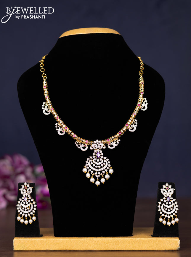 Zircon necklace with multicolour & cz stones and pearl hangings in gold finish