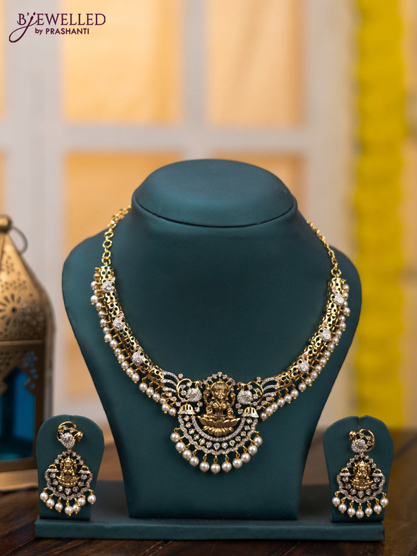 Zircon necklace lakshmi design with cz stones and pearl hangings in gold finish