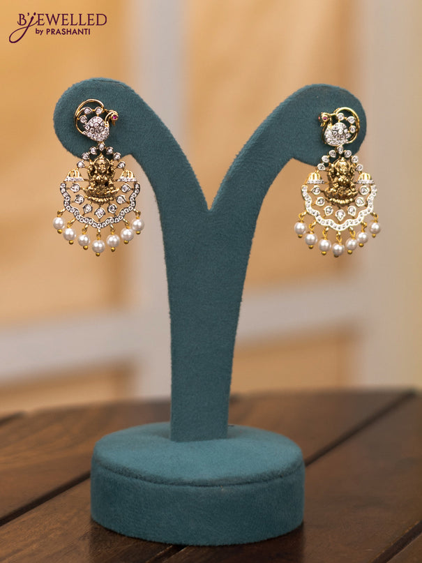 Zircon necklace lakshmi design with cz stones and pearl hangings in gold finish