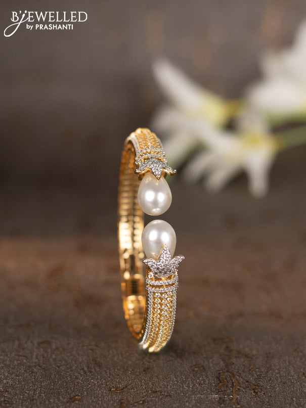 Bracelets with cz stones and pearls in gold finish