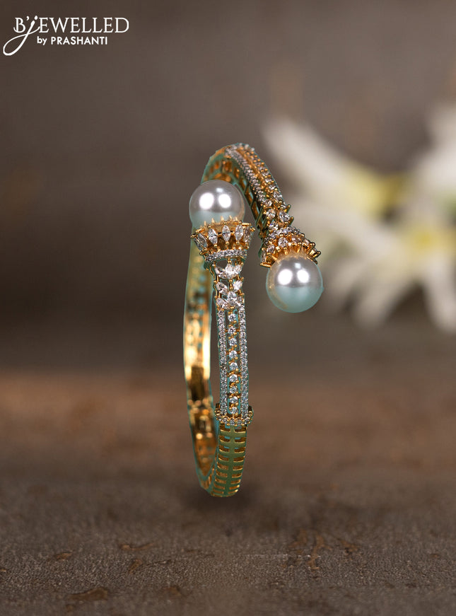 Bracelets with cz stones and pearls in gold finish