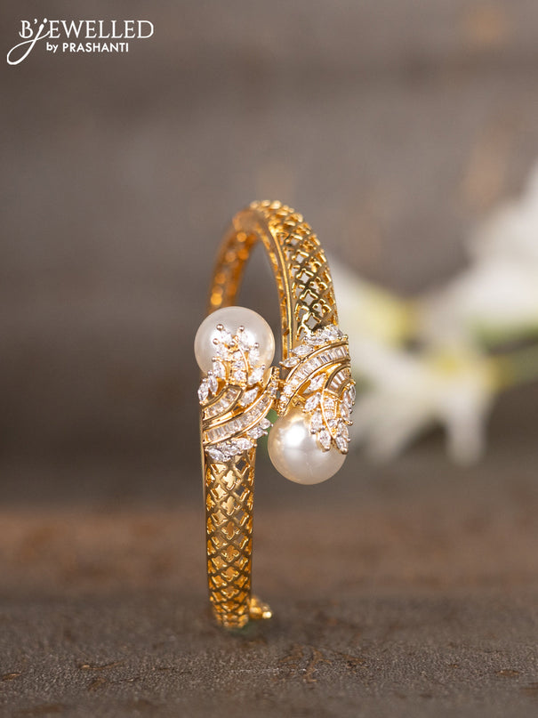 Bracelets with cz stones and pearls in gold finish