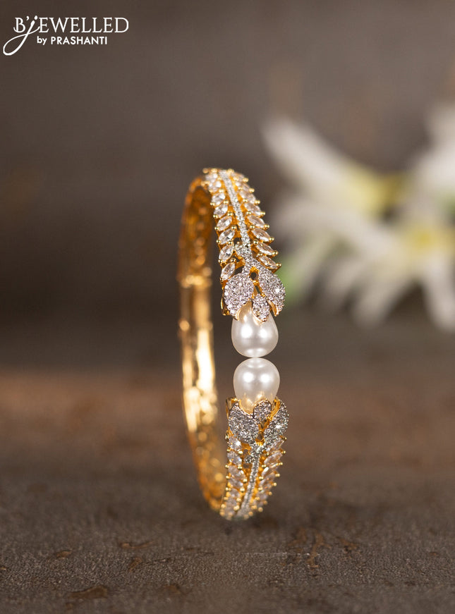 Bracelets with cz stones and pearls in gold finish