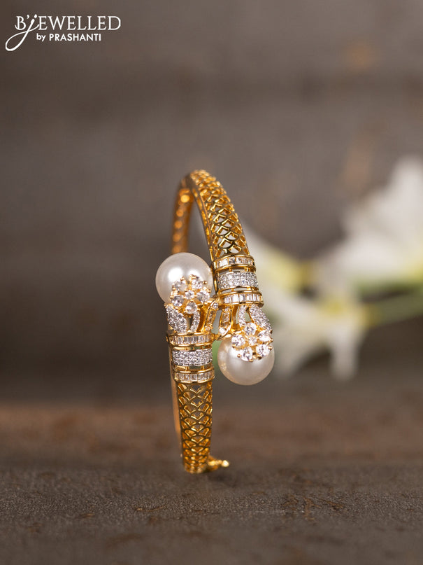 Bracelets with cz stones and pearls in gold finish