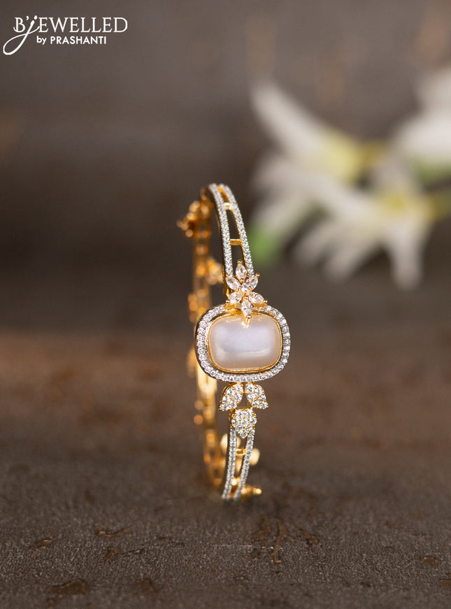 Bracelets with cz stones and pearls & hangings in gold finish